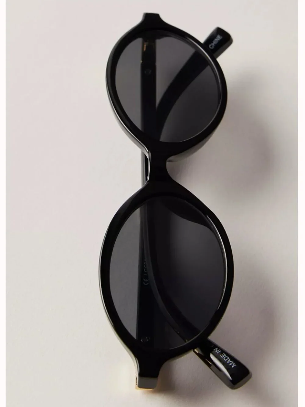 Free People Black Oval Sunglasses with Slim Frame
